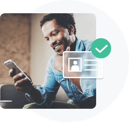 man smiling using cellphone